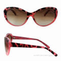 Women's sunglasses with metal accessories and colorful patterns